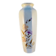 White ceramic vase with floral patterns