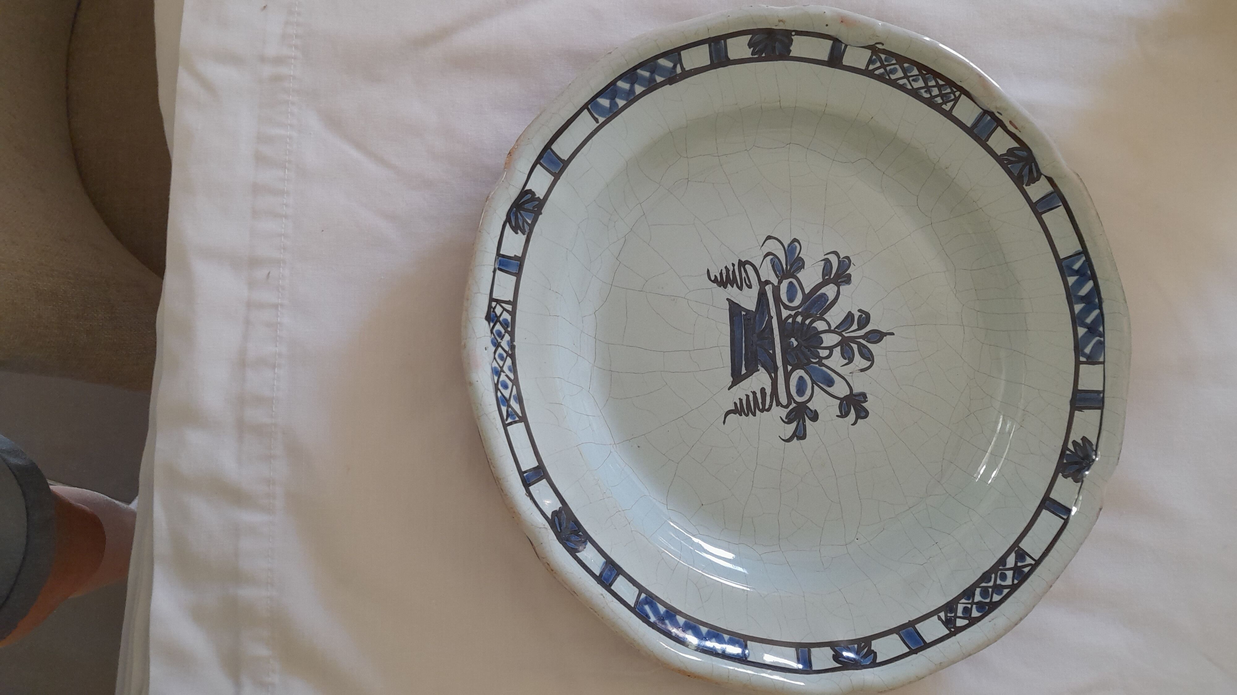 Old round dish in Rouen earthenware