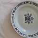 Old round dish in Rouen earthenware