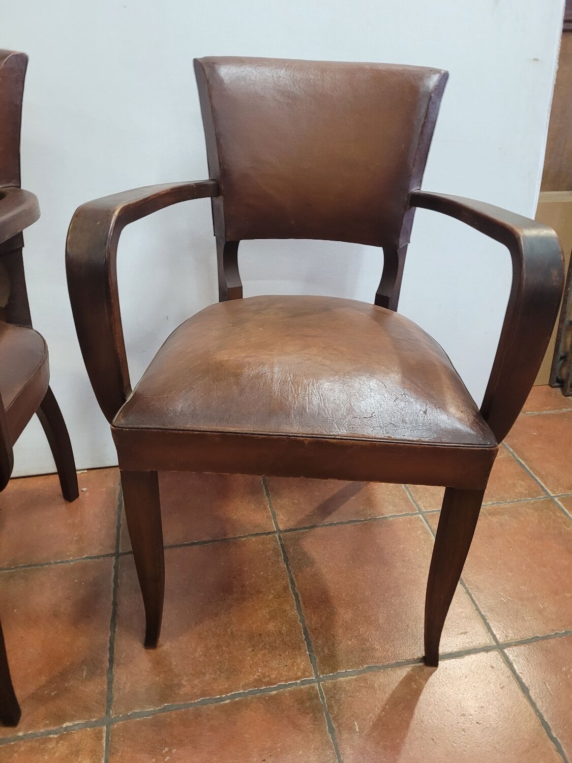 Pair of antique leather bridge armchairs