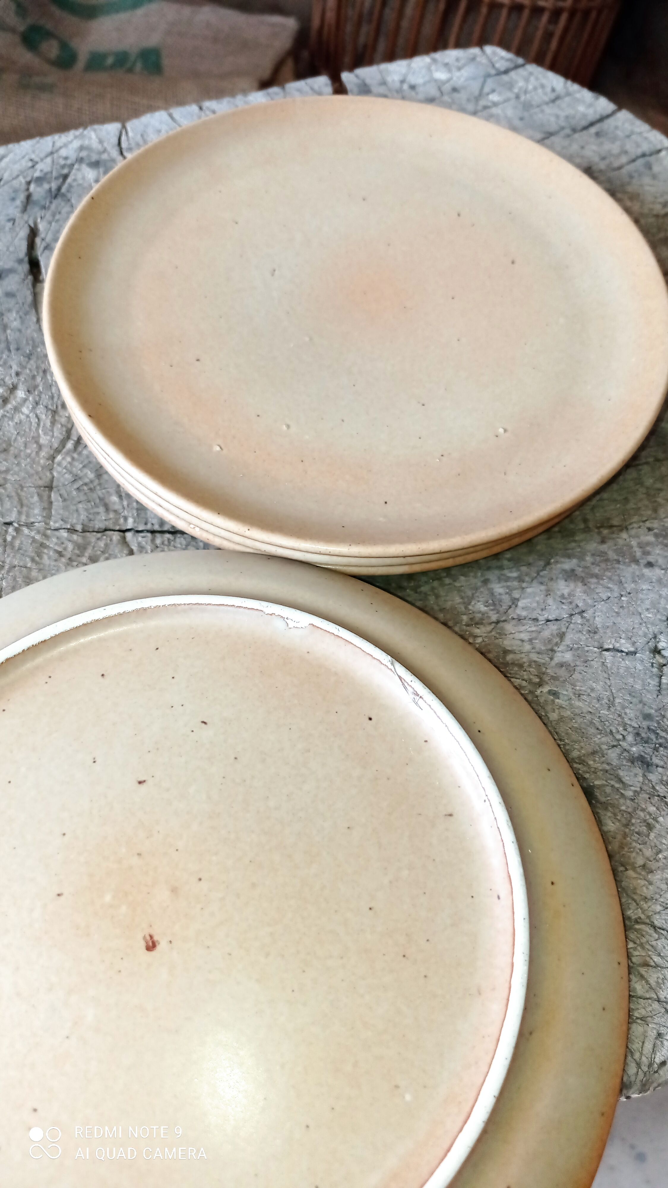 Set of four plates in sandstone
