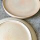 Set of four plates in sandstone