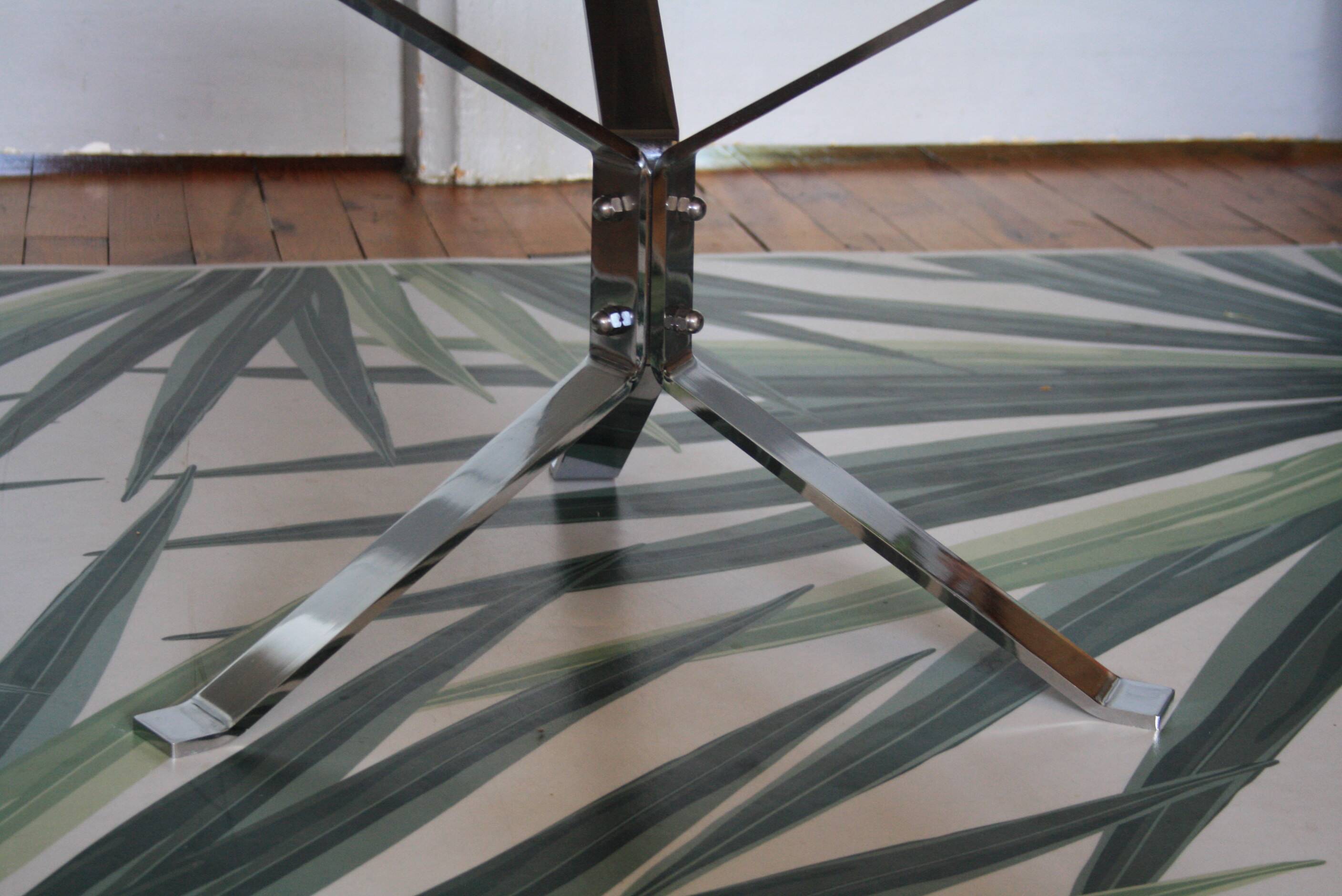 Round coffee table in smoked glass and chrome