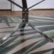 Round coffee table in smoked glass and chrome