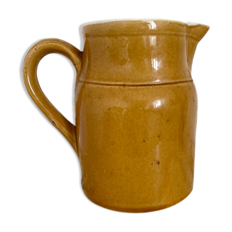 Ancient pitcher in sandstone