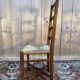 Set of 8 rustic high-back straw chairs.