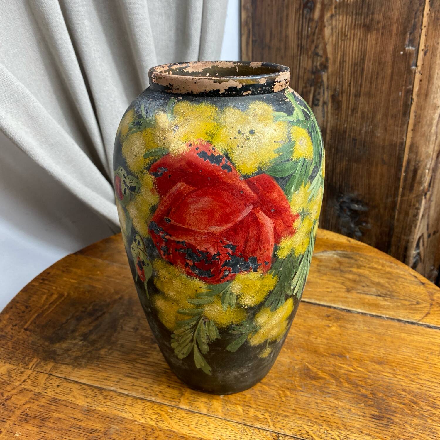 Terracotta vase with floral decoration