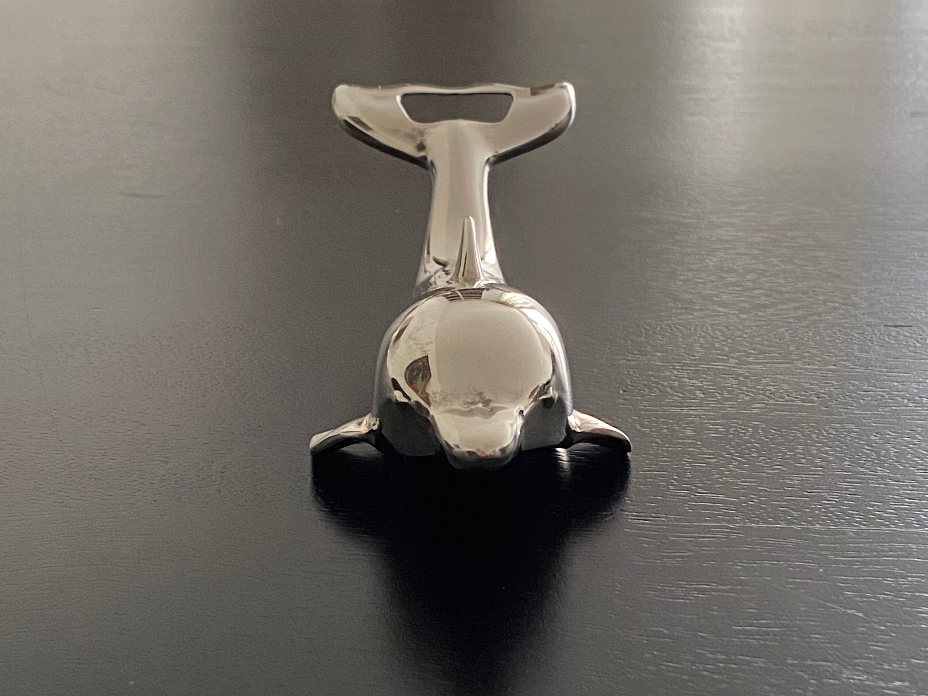 Bottle opener dolphin shape
