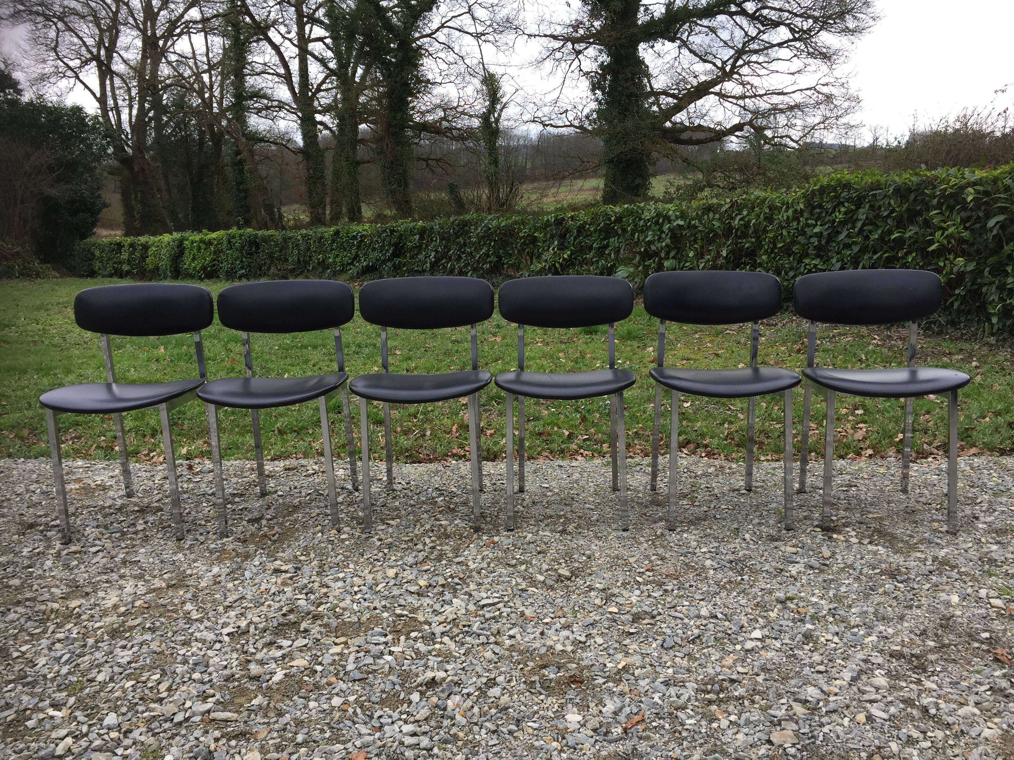 6 vintage chairs in black skaï with chrome metal tubular base.