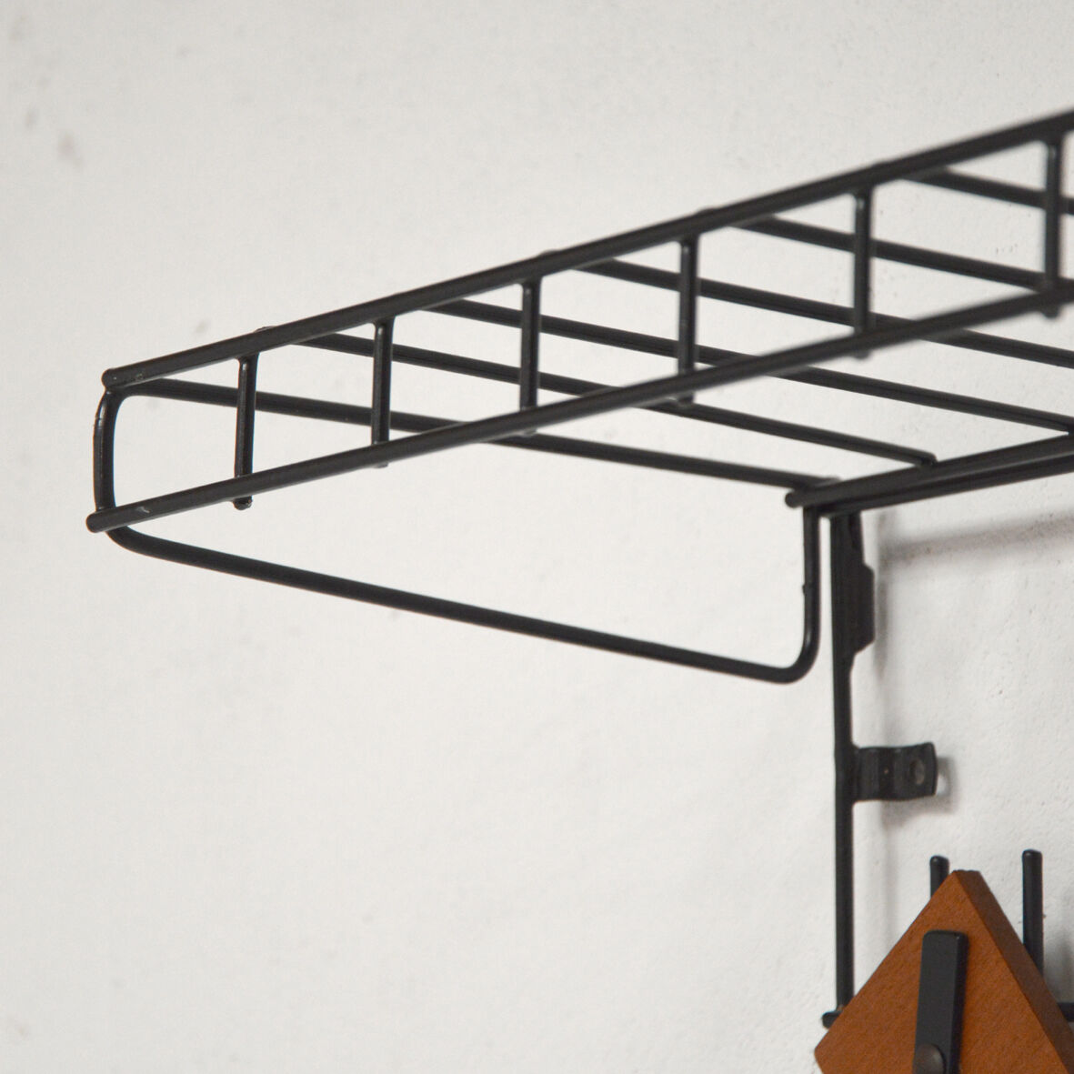 Metal and wood wall coat holders, 1960