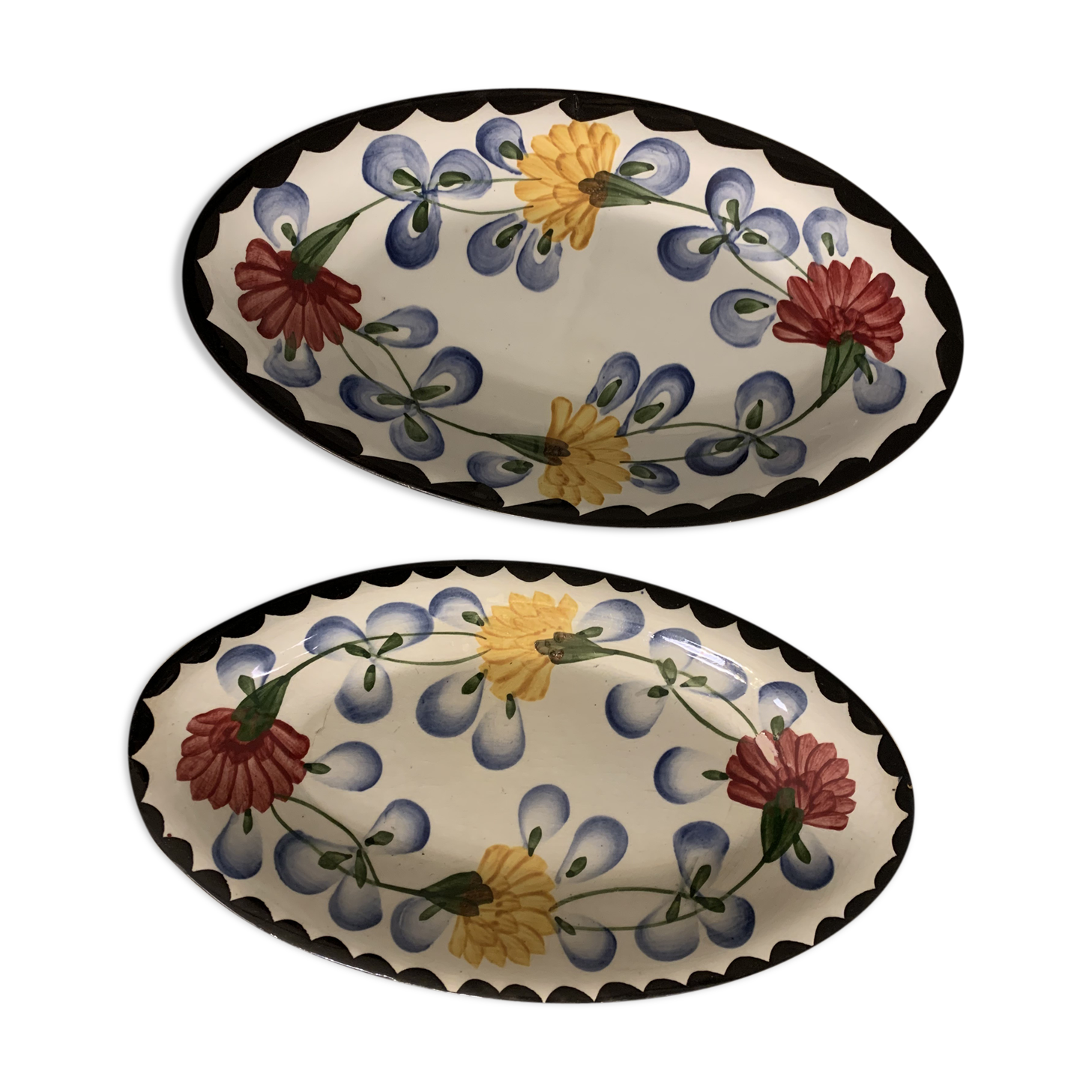 Pair of floral ravines in ancient earthenware Onnaing and CM Paris model Clovers