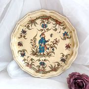 Decorative earthenware plate from Salins France, Moustiers decor, 25.5 cm