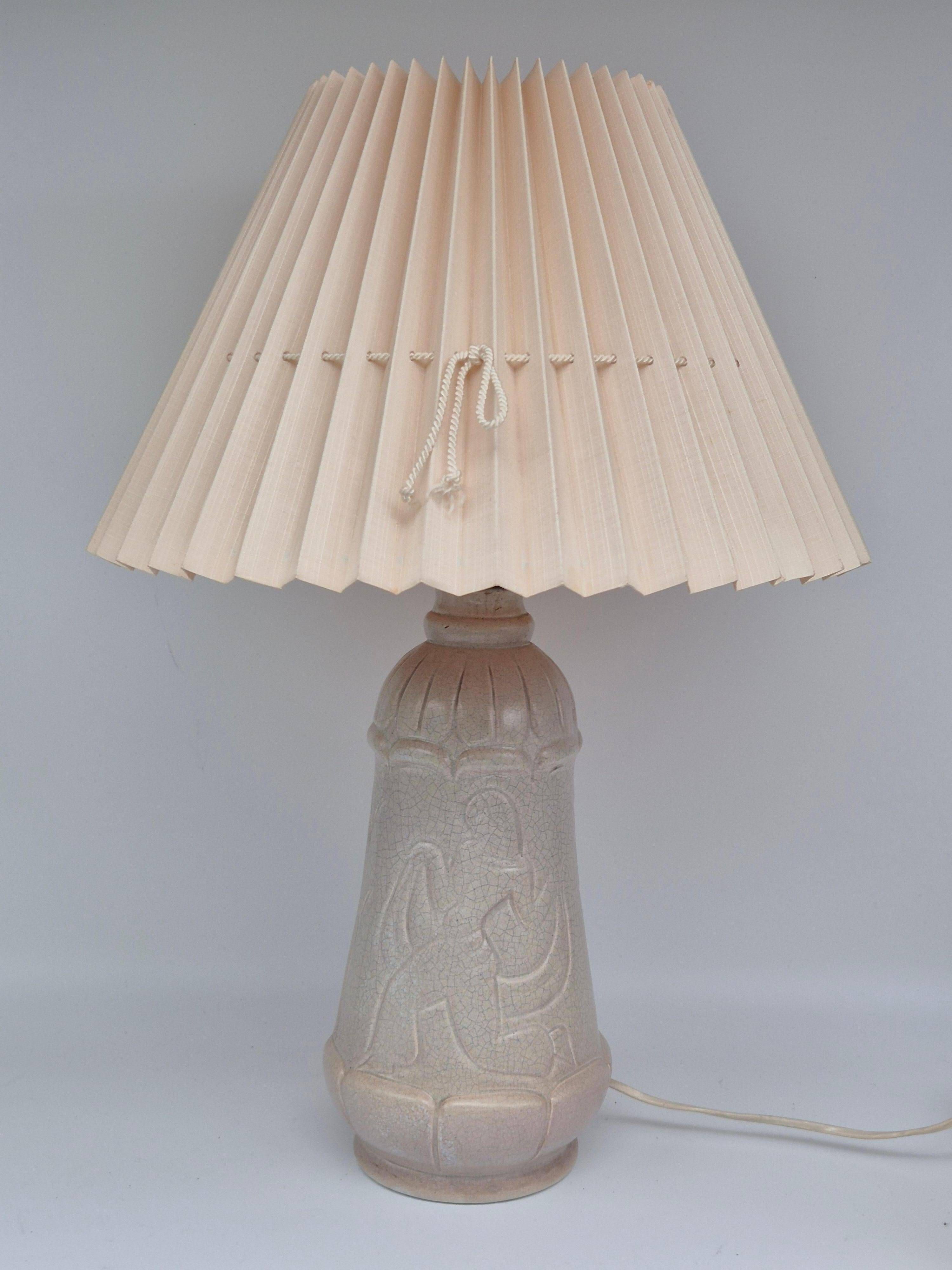 Rare Swedish decorative table lamp by Whiting, in white glazed ceramic, by Maggie Wibom.