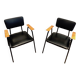 Paire de fauteuils laqués noirs modèle "M" de Pierre Guariche, vers 1950