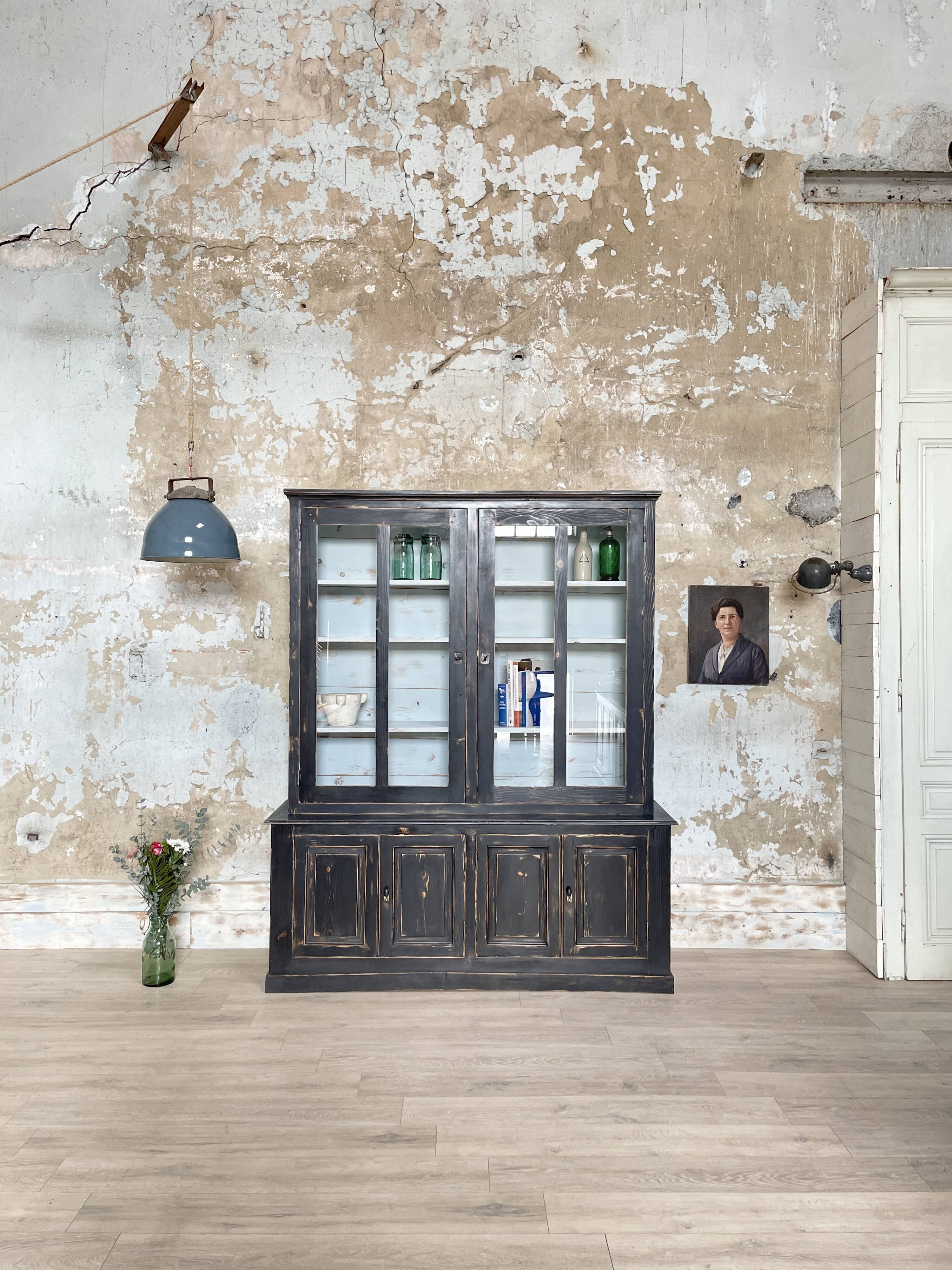 Display cabinet in patinated wood