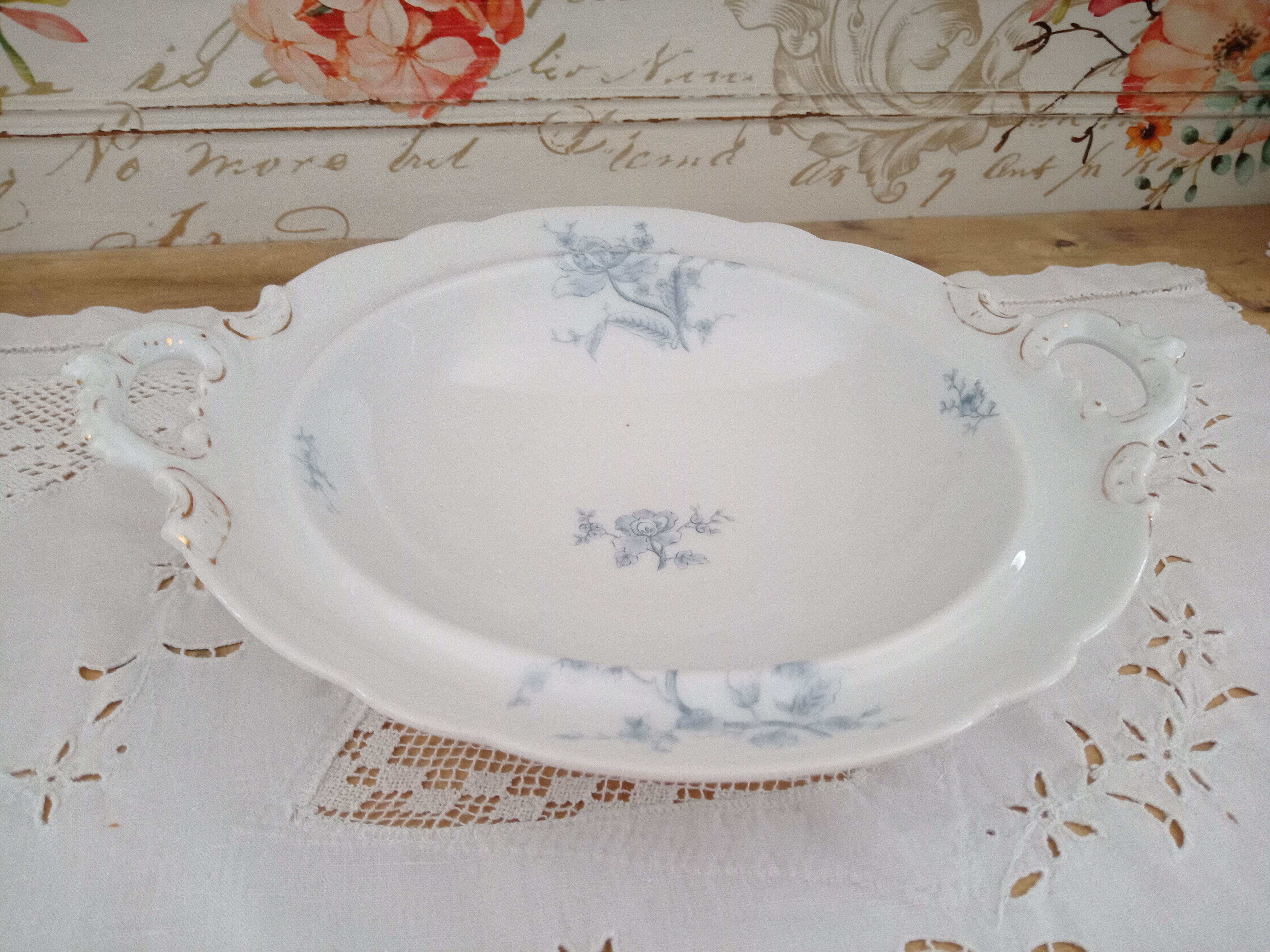 Compotier on porcelain pedestal decoration pale blue flowers