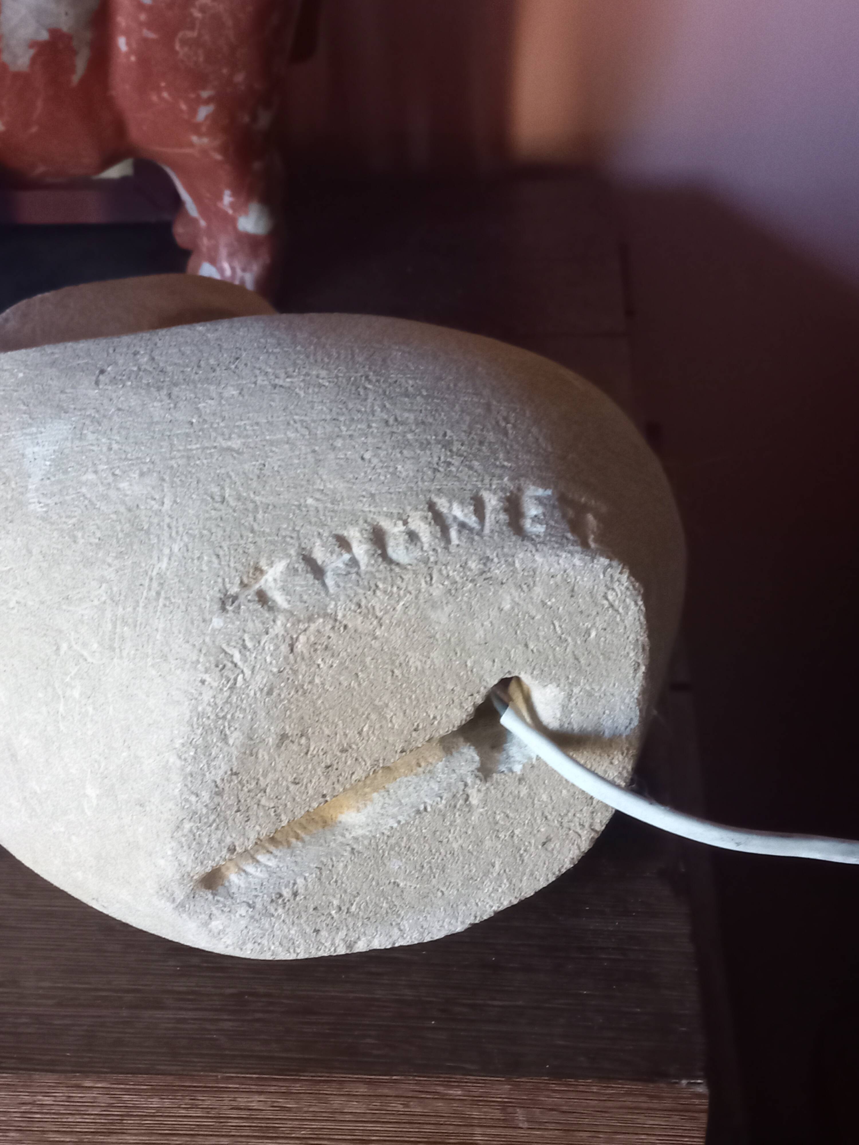 Sculpted stone lamp from the 1970s, signed.