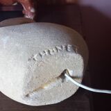 Sculpted stone lamp from the 1970s, signed.