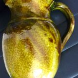 Pitcher vase, thick green glazed terracotta, signature to be identified