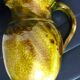Pitcher vase, thick green glazed terracotta, signature to be identified