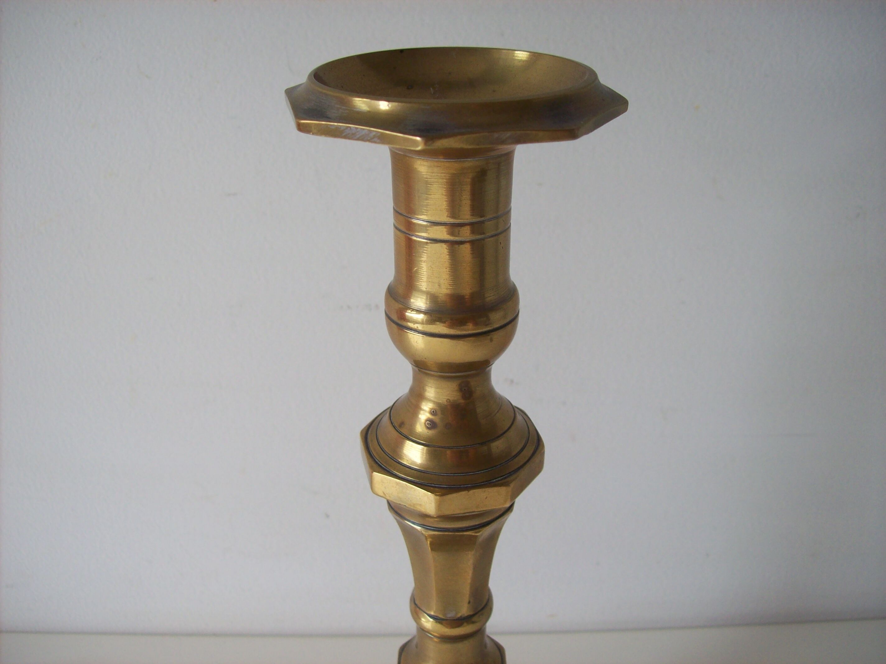Former Golden brass candlestick