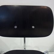 Set of four Egon Eiermann model SE 68 chairs in black lacquered plywood and steel.