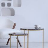 Trundle tables in imperial brown marble.