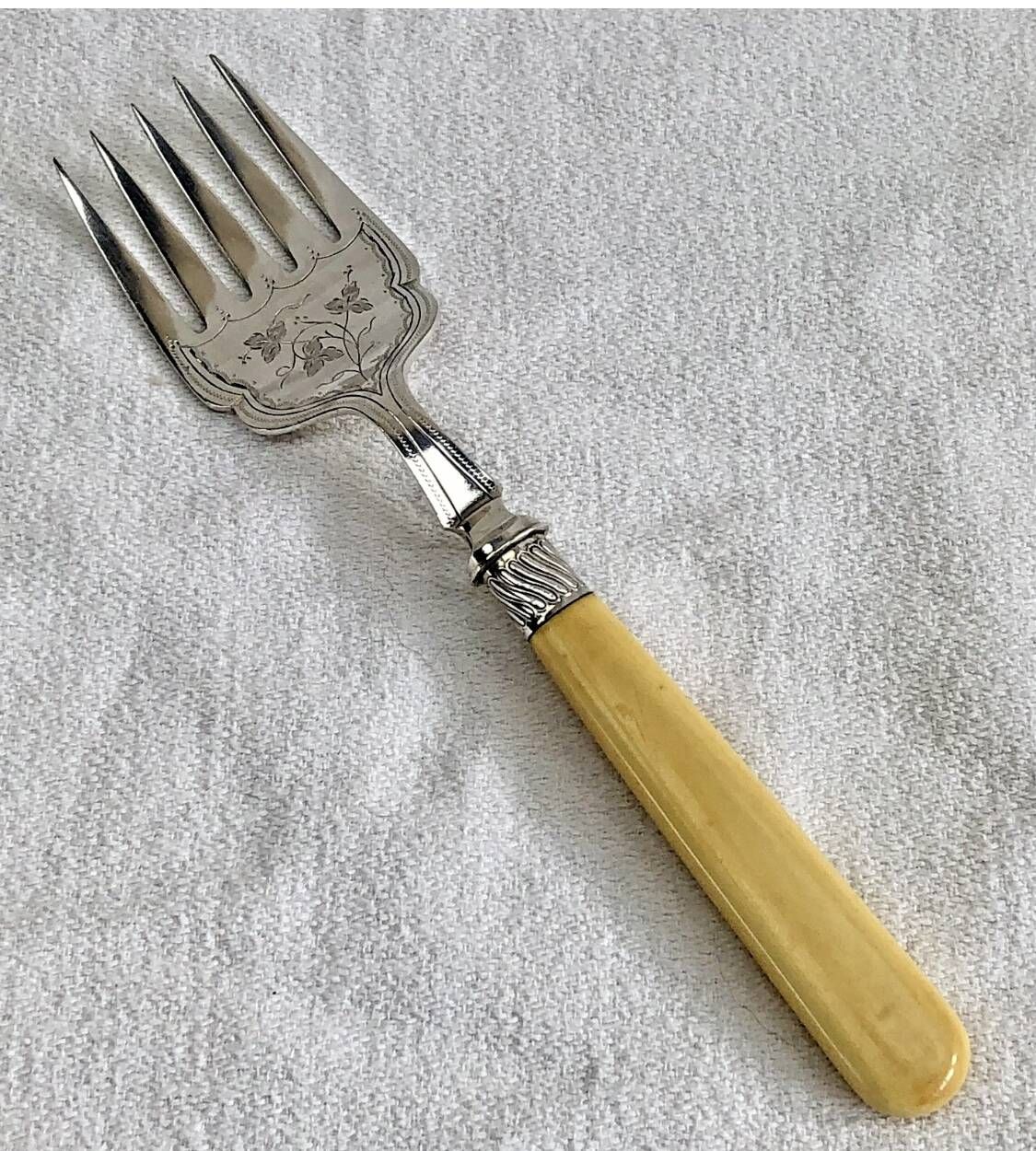 Antique Victorian fish serving cutlery, bone and silver-plated metal