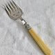 Antique Victorian fish serving cutlery, bone and silver-plated metal