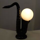 1980' Saxophone lamp in black earthenware & opaline globe