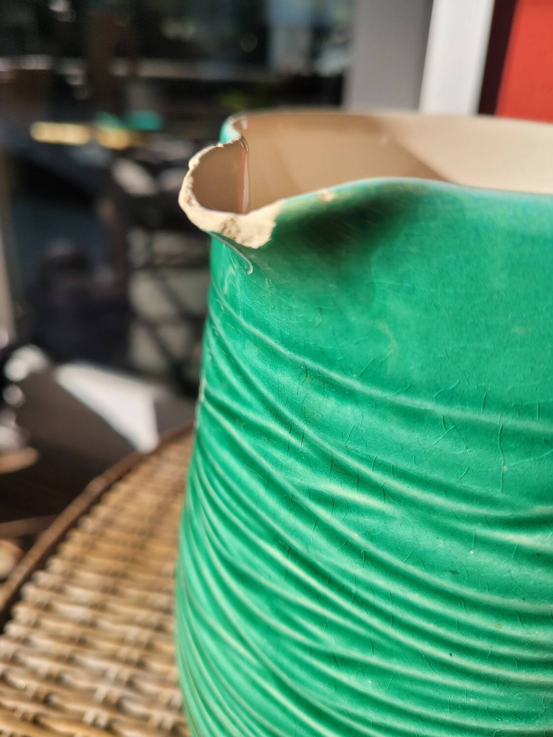 Green glazed ceramic pitcher