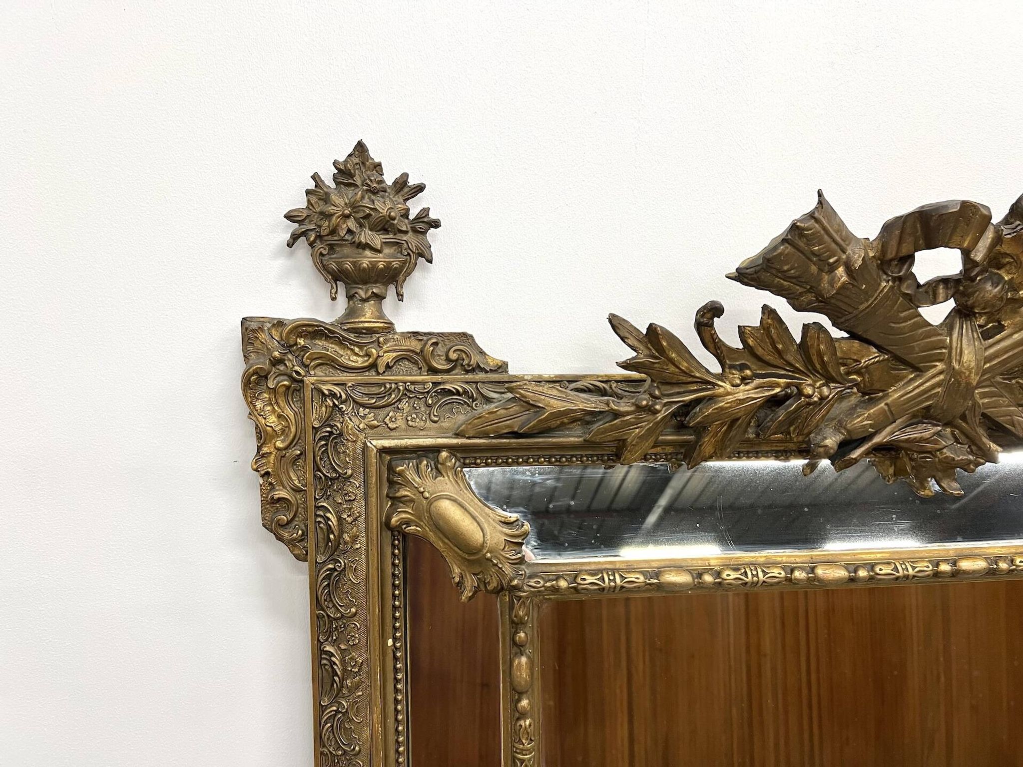 Large antique pediment mirror with mouldings.