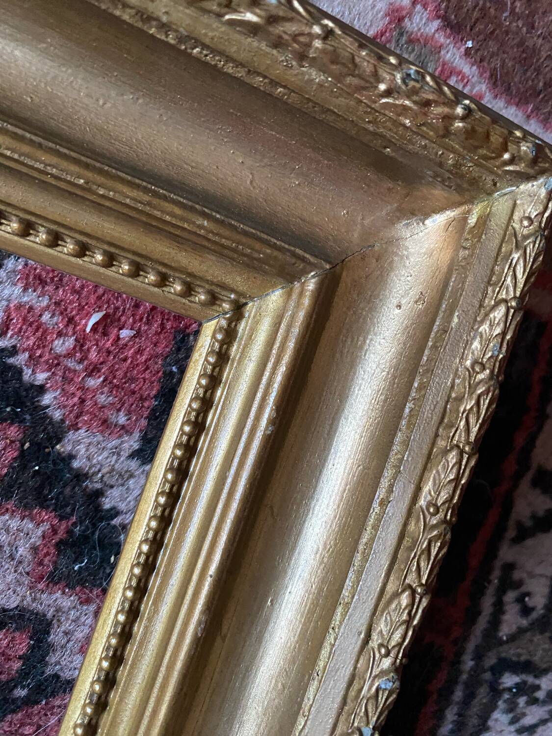 Old gilded wood frame.
