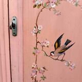 Old pink Parisian cabinet with painted decor