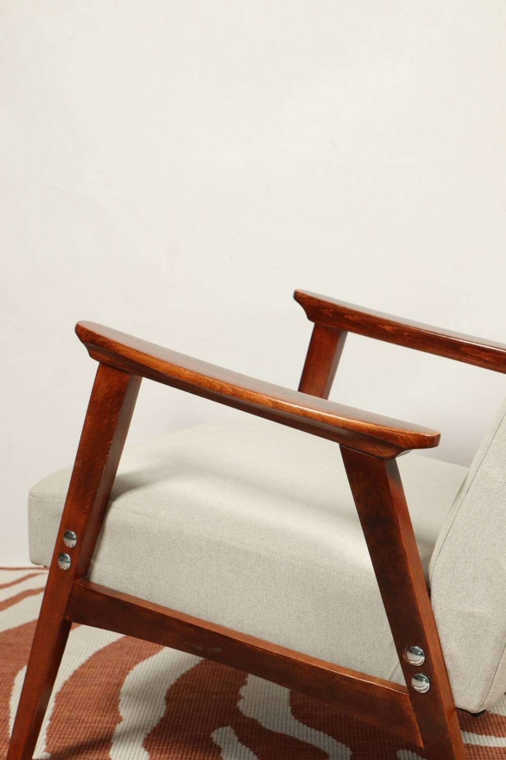 Vintage light gray armchair dark wood Scandinavian design 1970