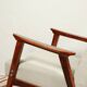 Vintage light gray armchair dark wood Scandinavian design 1970