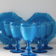 Old table set in blue pressed moulded glass