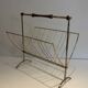 Brass and wood magazine rack, in the style of Cesare Lacca.