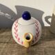 Teapot in white ceramic baseball