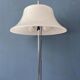 Vintage Space Age floor lamp with white plexiglass UFO shade.