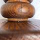 Vintage turned wood table lamp with floral drum shade.