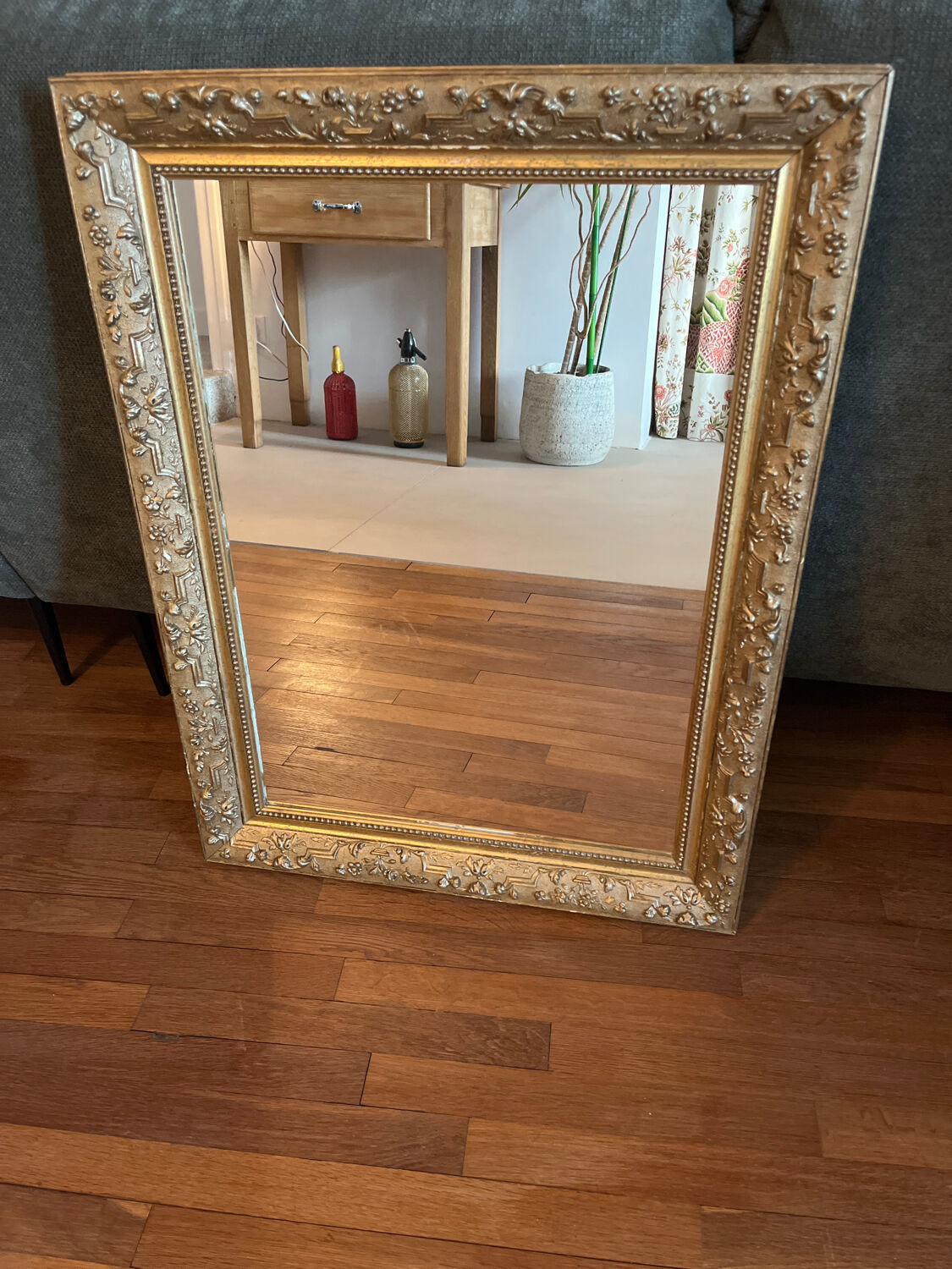 Gilded mirror with antique wood and stucco frame