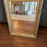 Gilded mirror with antique wood and stucco frame