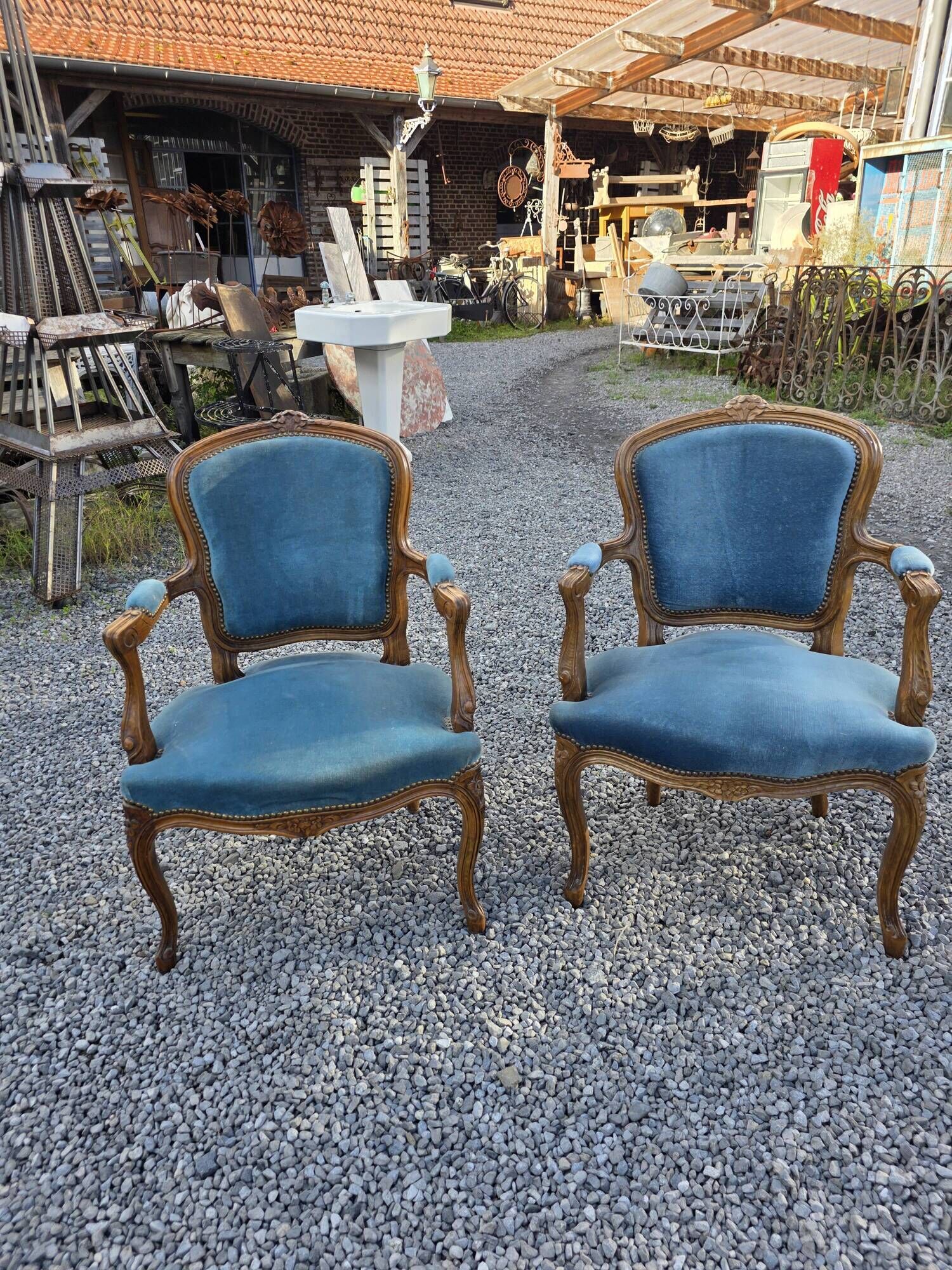 Pair of Louis XV style cabriolet armchairs