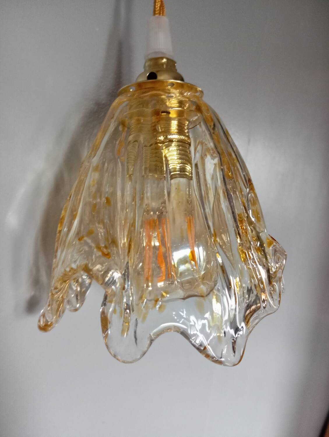 Pair of draped blown glass hanging lamps, ocher twisted wire