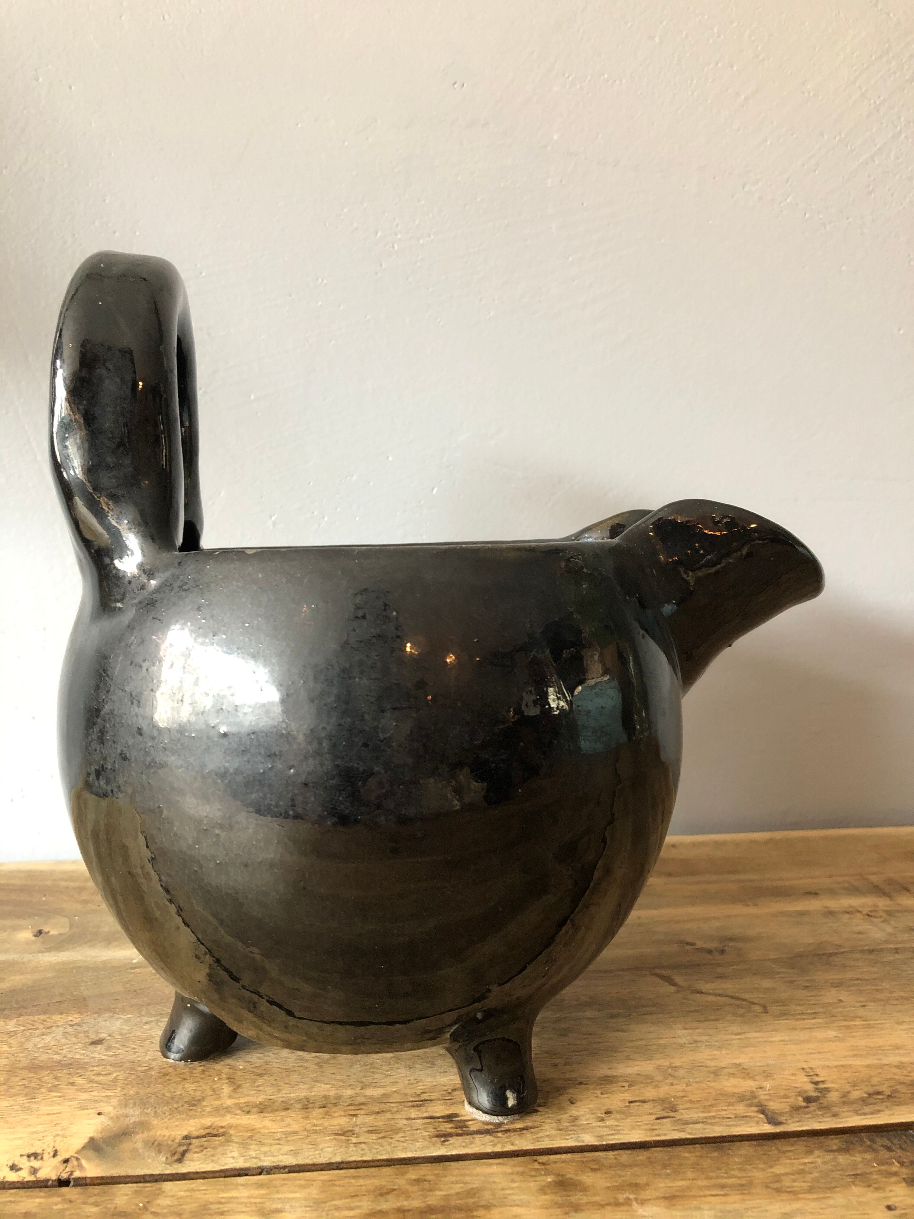 Vintage tripod ceramics pitcher