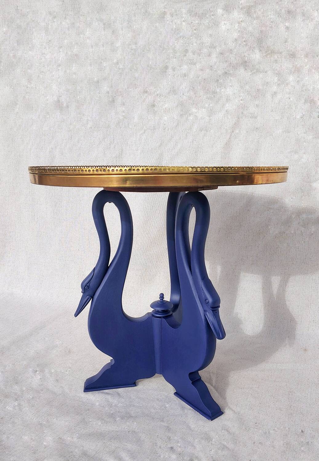 Side table with swan legs