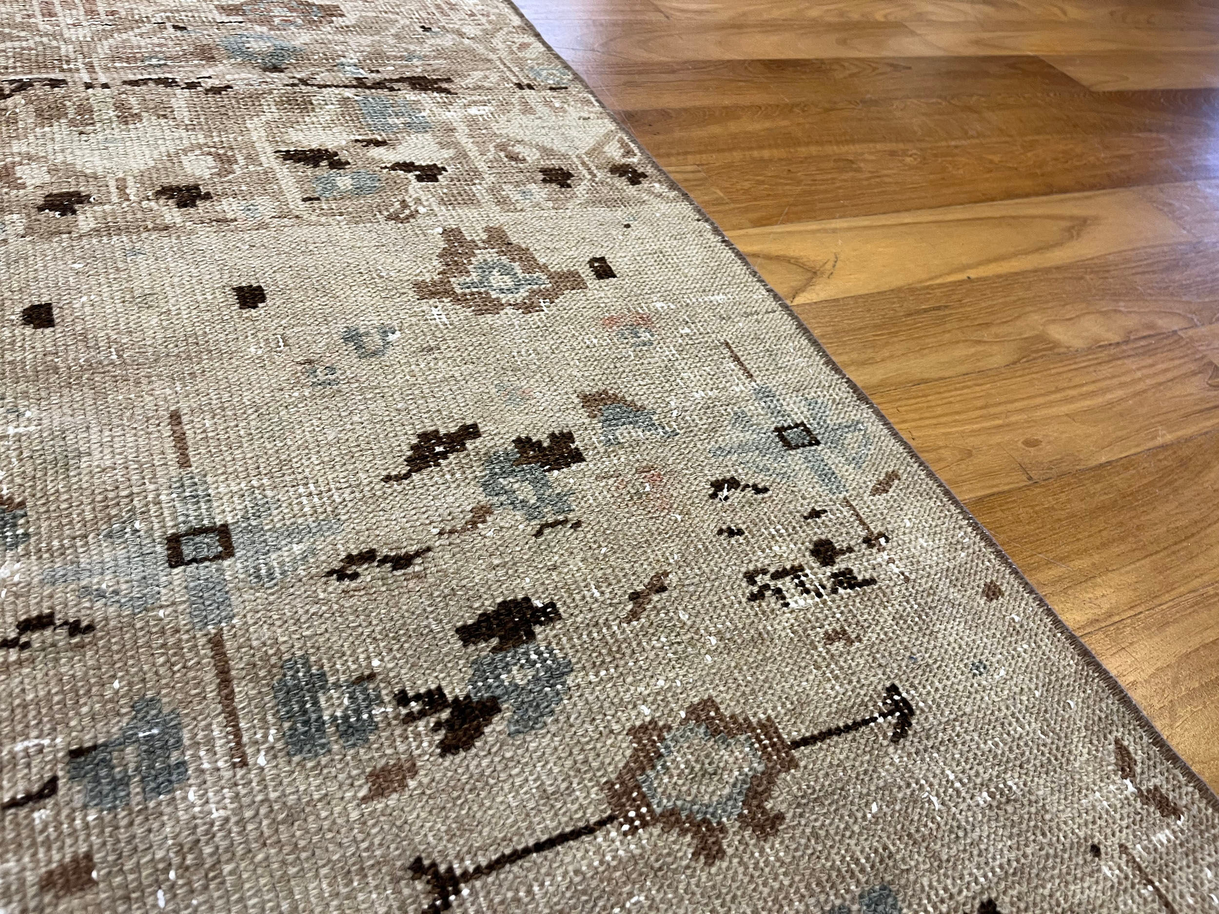 Unique aztec design muted handmade old rug