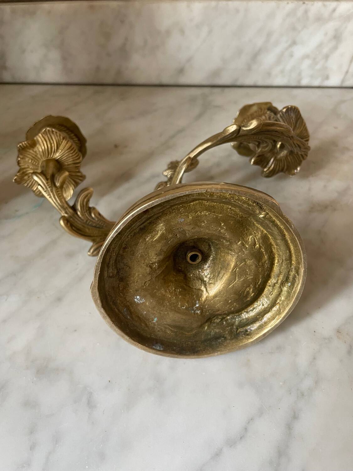 Pair of rocaille candlesticks in gilded bronze