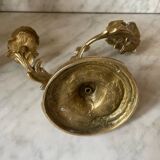 Pair of rocaille candlesticks in gilded bronze